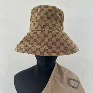 Guccis Women’s GG canvas wide brim hat